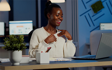 galleries/happy-african-freelancer-receving-good-news-laptop-working-overtime-start-up-company-office.jpg